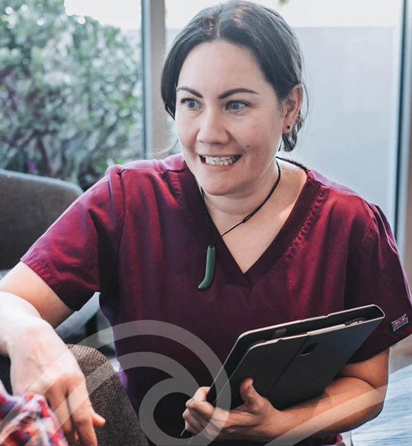 Woman in red clothing working with tablet