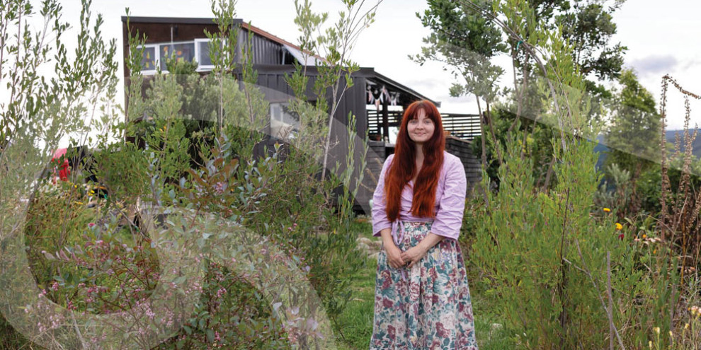Anna Naygrow stands in her garden
